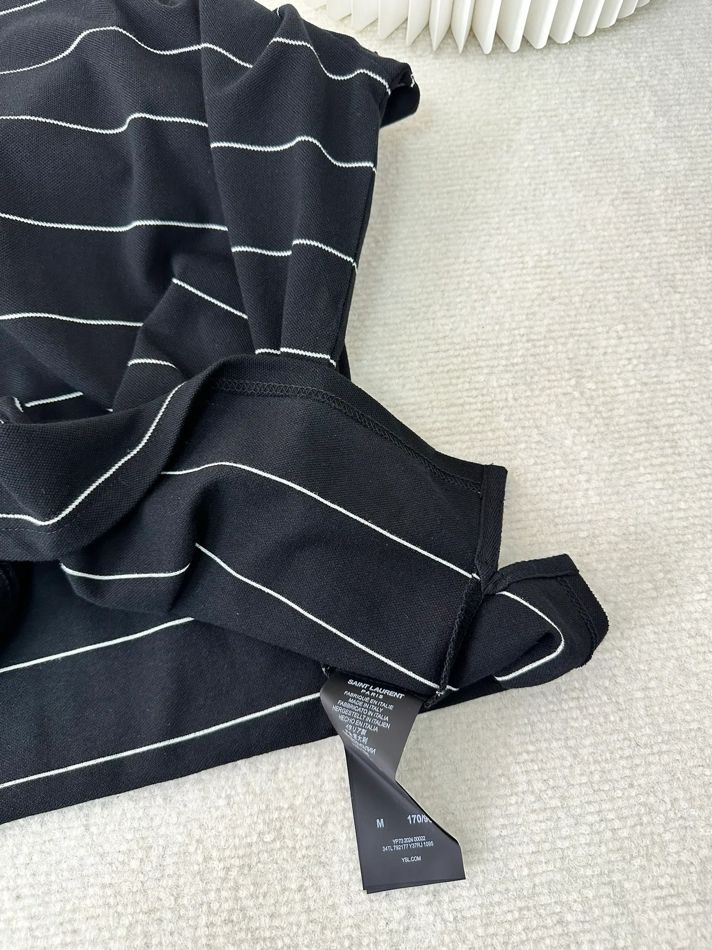 P320 Saint Laurent logo embroidered striped POLO shirt (authentic version - physical counter - top luxury quality) 🆚Instant sale of all versions on the market Customized elegant striped piqué cotton, breathable and dry. Striped elements jump across the clothes, showing a unique visual beauty. The YSL logo embroidered on the chest is vividly displayed on the garment, highlighting its unique identity and charm.  Adopt imported machine embroidery technology, use advanced computer control system and precision mechanical components to realize YSL logo embroidery operation. Size: s m l xl